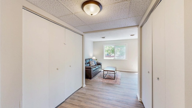 929 40th St NW, Rochester, MN 55901 - hallway featuring light wood-style floors and a drop ceiling