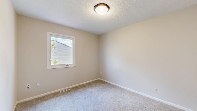929 40th St NW, Rochester, MN 55901 - unfurnished room featuring carpet floors and baseboards