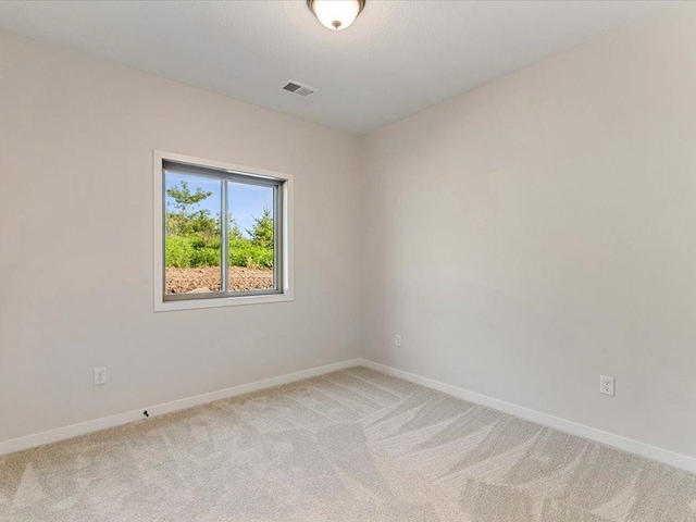 31418 Isabelle Dr, Pequot Lakes, MN 56472 - spare room featuring light carpet and baseboards