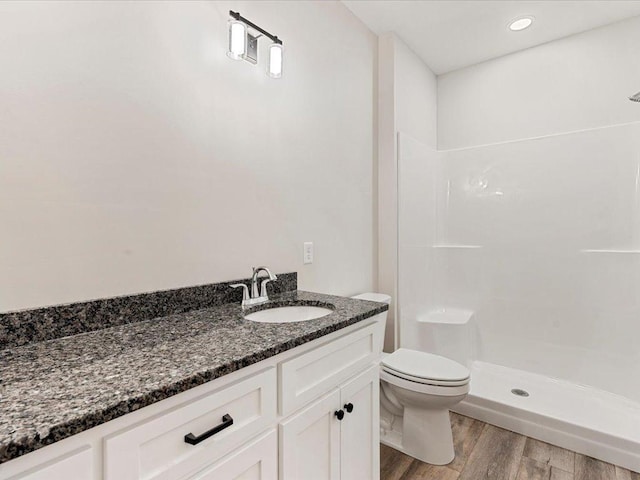 31418 Isabelle Dr, Pequot Lakes, MN 56472 - full bath featuring vanity, wood finished floors, and a shower