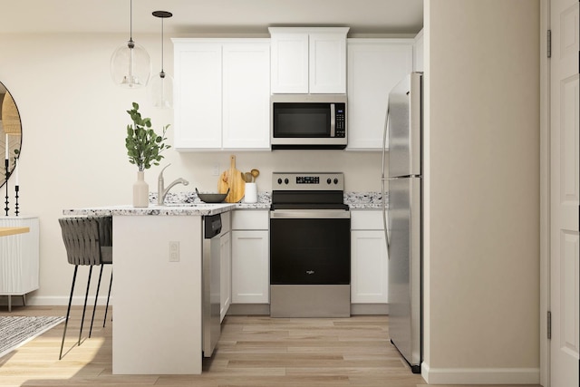 5368 397th St, North Branch, MN 55056 - kitchen with stainless steel appliances, a peninsula, light wood-style flooring, and white cabinets