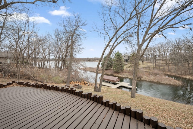 6485 46th Ave SE, Haven Twp, MN 56304 - wooden deck featuring a water view and a boat dock