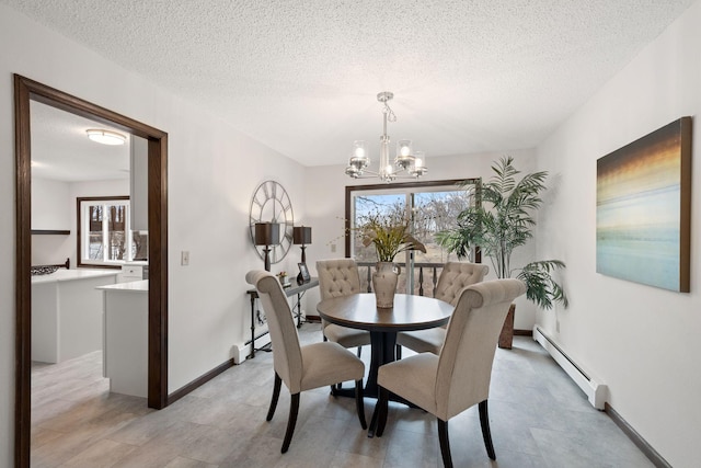 6485 46th Ave SE, Haven Twp, MN 56304 - dining room with a baseboard radiator, a chandelier, plenty of natural light, and a textured ceiling