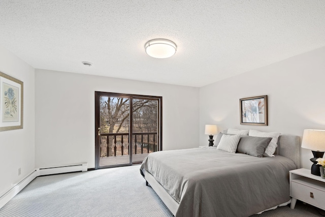 6485 46th Ave SE, Haven Twp, MN 56304 - bedroom featuring carpet floors, access to exterior, a textured ceiling, and baseboard heating