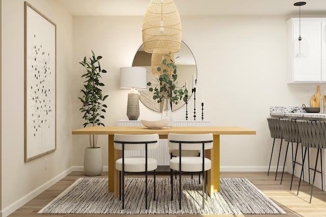 39787 Fallbrook Ave, North Branch, MN 55056 - dining room featuring light wood finished floors and baseboards