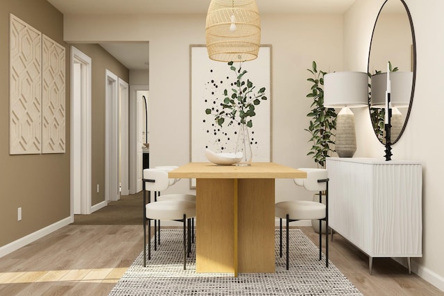 39787 Fallbrook Ave, North Branch, MN 55056 - dining area with light wood-style flooring and baseboards