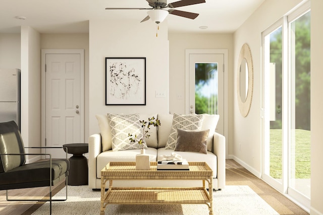 39787 Fallbrook Ave, North Branch, MN 55056 - carpeted living room with ceiling fan and plenty of natural light