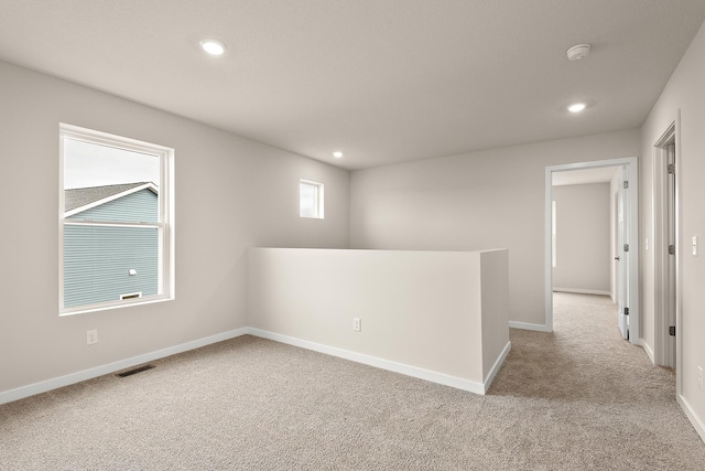 39746 Fallbrook Ave, North Branch, MN 55056 - unfurnished room with carpet, a smoke detector, and recessed lighting