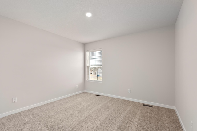 39746 Fallbrook Ave, North Branch, MN 55056 - spare room with light carpet and recessed lighting