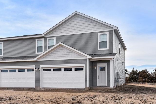 39746 Fallbrook Ave, North Branch, MN 55056 - view of front of property with a garage and driveway