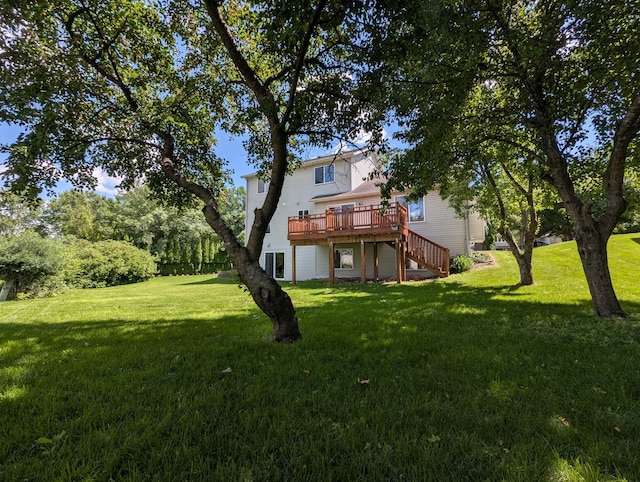 3417 42nd St NW, Rochester, MN 55901 - back of house featuring a wooden deck, stairs, and a yard
