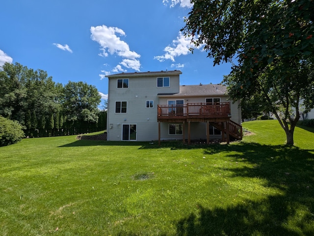 3417 42nd St NW, Rochester, MN 55901 - rear view of property featuring a wooden deck, stairs, and a yard