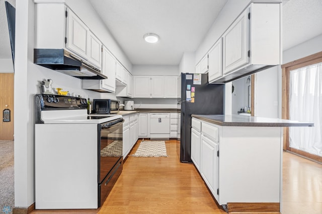 2350 20th Ave S, Fargo, ND 58103 - kitchen with black appliances, white cabinetry, under cabinet range hood, light wood-style floors, and dark countertops