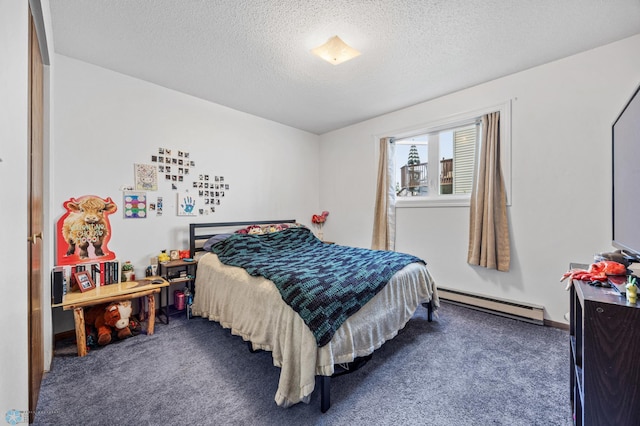 2350 20th Ave S, Fargo, ND 58103 - carpeted bedroom featuring baseboard heating and a textured ceiling