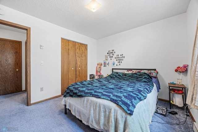 2350 20th Ave S, Fargo, ND 58103 - carpeted bedroom with a closet and a textured ceiling