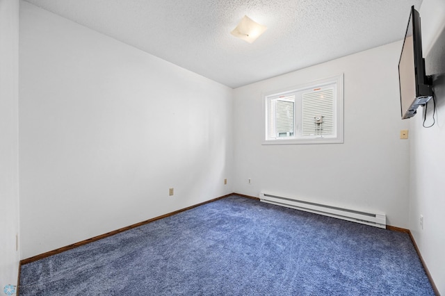2350 20th Ave S, Fargo, ND 58103 - carpeted empty room featuring baseboard heating and a textured ceiling