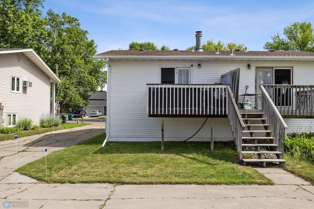 2350 20th Ave S, Fargo, ND 58103 - back of house featuring stairway, a deck, and a lawn