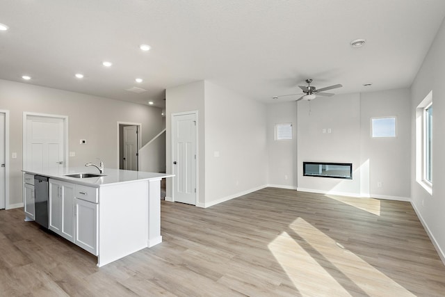 39726 Fallbrook Ave, North Branch, MN 55056 - kitchen featuring stainless steel dishwasher, recessed lighting, healthy amount of natural light, and light wood-type flooring
