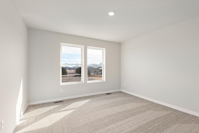 39726 Fallbrook Ave, North Branch, MN 55056 - carpeted spare room featuring baseboards and recessed lighting
