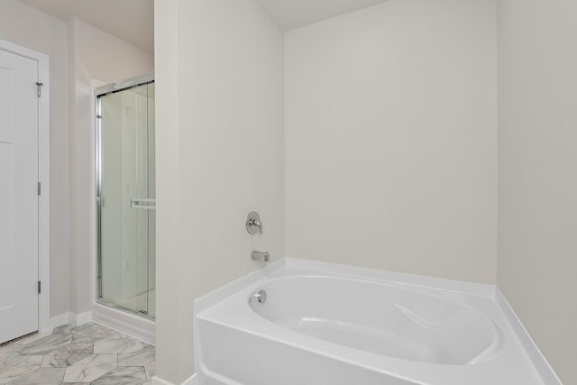 39726 Fallbrook Ave, North Branch, MN 55056 - full bathroom featuring a garden tub, a shower stall, and marble look tile flooring