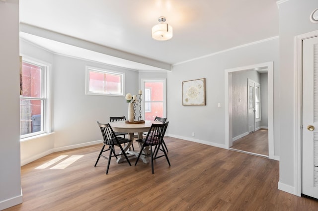 2804 Pillsbury Ave S, Minneapolis, MN 55408 - dining space with wood finished floors and ornamental molding