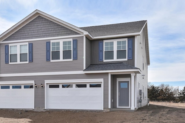 39723 Fallbrook Ave, North Branch, MN 55056 - view of front of home featuring an attached garage, driveway, and a shingled roof