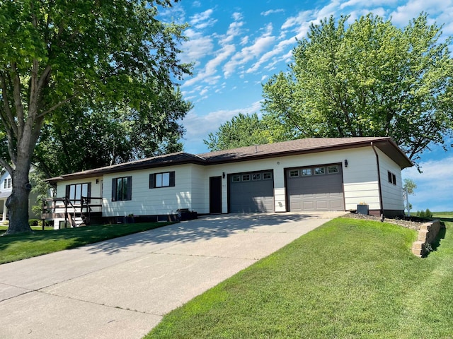 402 Range Rd, Springfield, MN 56087 - ranch-style home with an attached garage, concrete driveway, and a front yard