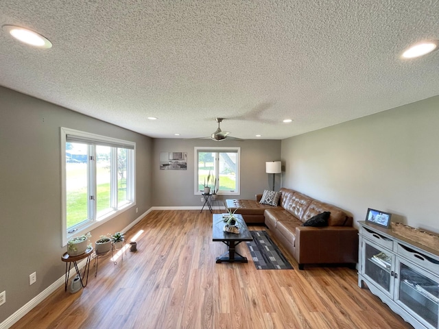 402 Range Rd, Springfield, MN 56087 - living room with recessed lighting, a textured ceiling, a ceiling fan, and wood finished floors