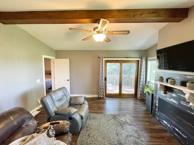 402 Range Rd, Springfield, MN 56087 - living room featuring beam ceiling, ceiling fan, and dark wood-style floors