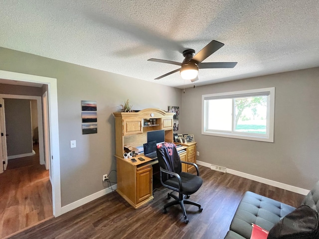 402 Range Rd, Springfield, MN 56087 - office space with dark wood finished floors, a ceiling fan, and a textured ceiling