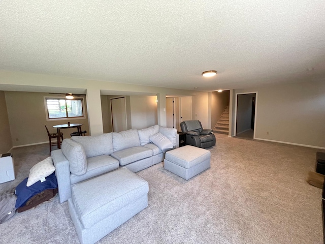 402 Range Rd, Springfield, MN 56087 - carpeted living area featuring a textured ceiling and stairway