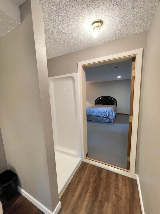 402 Range Rd, Springfield, MN 56087 - corridor featuring wood finished floors and a textured ceiling