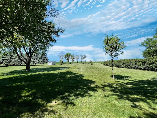 402 Range Rd, Springfield, MN 56087 - view of community with a storage unit and a lawn