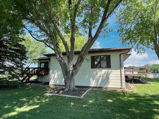 402 Range Rd, Springfield, MN 56087 - view of property exterior with stairs, a deck, and a yard