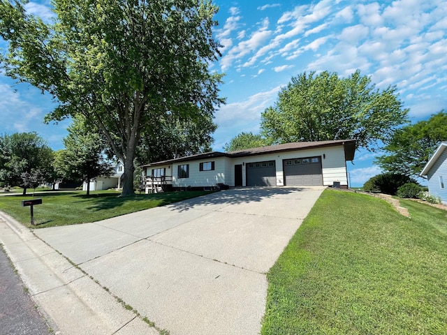 402 Range Rd, Springfield, MN 56087 - single story home with an attached garage, driveway, and a front lawn