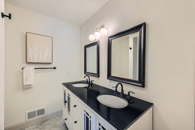 8222 Brandywine Pkwy, Brooklyn Park, MN 55444 - full bathroom featuring double vanity and marble finish floors