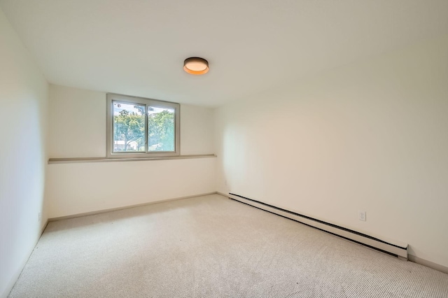 8222 Brandywine Pkwy, Brooklyn Park, MN 55444 - unfurnished room with baseboard heating and carpet