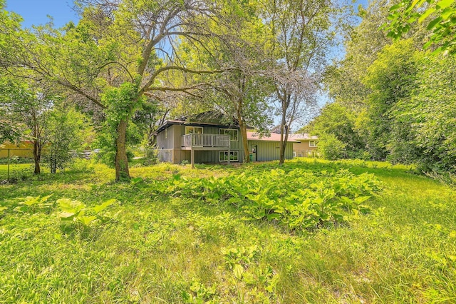 8222 Brandywine Pkwy, Brooklyn Park, MN 55444 - view of yard with a balcony