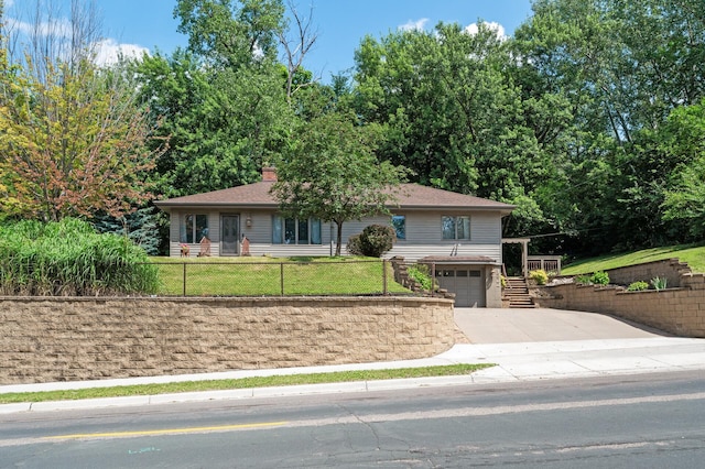 1322 Bidwell St, West Saint Paul, MN 55118 - ranch-style house featuring driveway, stairway, an attached garage, and a chimney
