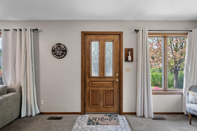 1322 Bidwell St, West Saint Paul, MN 55118 - carpeted foyer entrance with baseboards