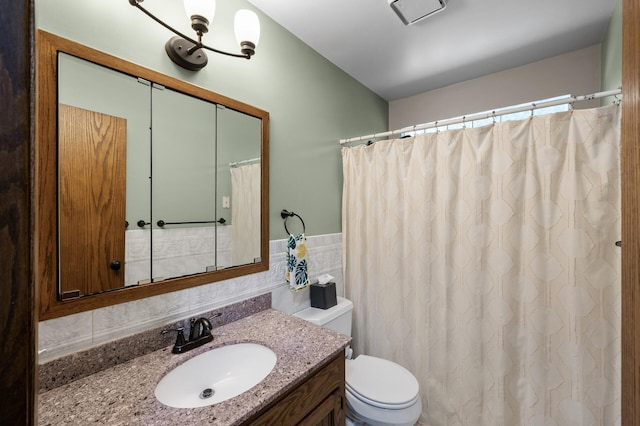 1322 Bidwell St, West Saint Paul, MN 55118 - bathroom with vanity, tile walls, and curtained shower