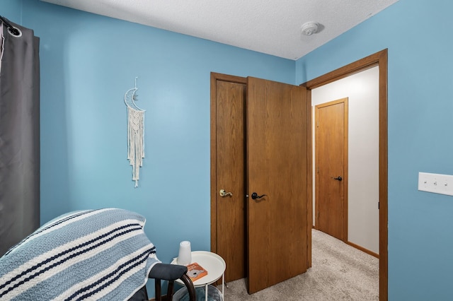 1322 Bidwell St, West Saint Paul, MN 55118 - bedroom with light colored carpet and a closet