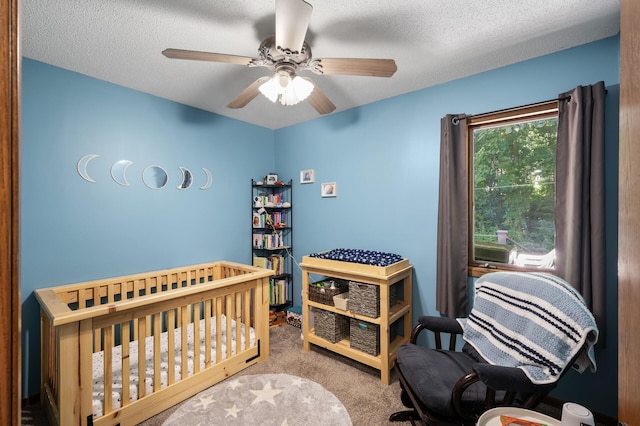 1322 Bidwell St, West Saint Paul, MN 55118 - bedroom featuring carpet flooring, a ceiling fan, and a textured ceiling