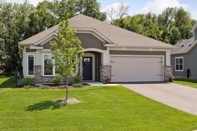 1101 Fabel Ln, Waconia, MN 55387 - craftsman-style home featuring stone siding, a shingled roof, and an attached garage
