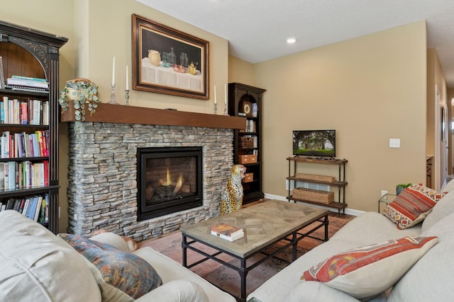 1101 Fabel Ln, Waconia, MN 55387 - living area with a stone fireplace and recessed lighting