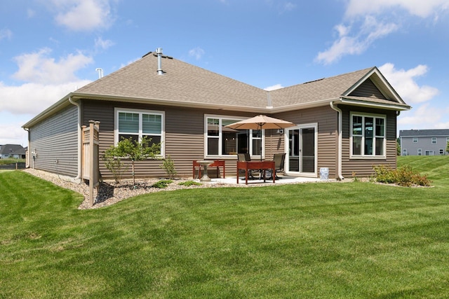 1101 Fabel Ln, Waconia, MN 55387 - rear view of house featuring a patio, a lawn, and roof with shingles