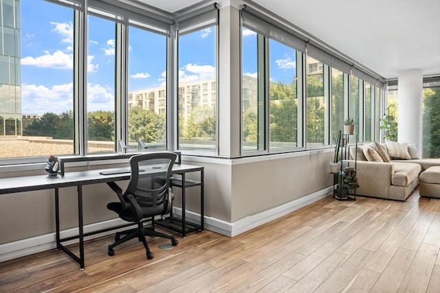 8151 33rd Ave S Unit 201, Bloomington, MN 55425 - office with light wood-style flooring and baseboards