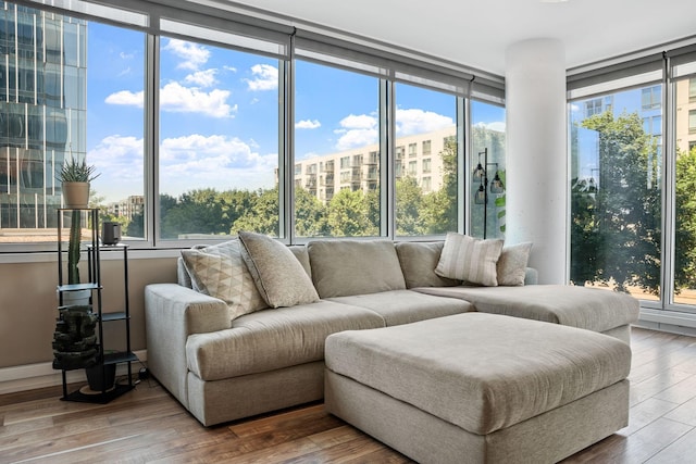 8151 33rd Ave S Unit 201, Bloomington, MN 55425 - living area featuring plenty of natural light and wood finished floors