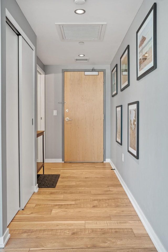 8151 33rd Ave S Unit 201, Bloomington, MN 55425 - hall featuring attic access and light wood-style flooring