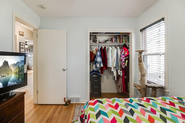 2074 Mcknight Rd N, North Saint Paul, MN 55109 - bedroom with a closet and wood finished floors